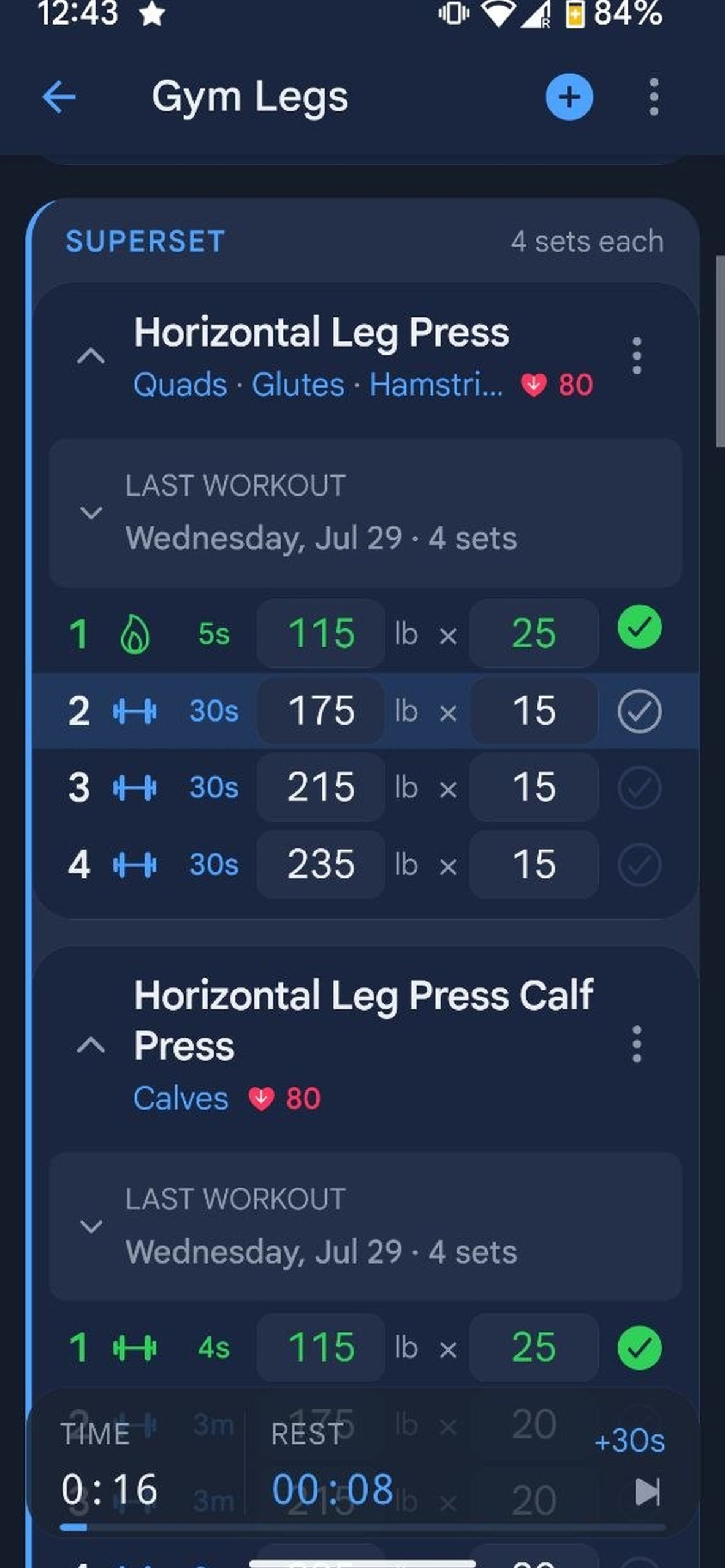 GainBook active workout screen showing a leg press superset and the rest timer
